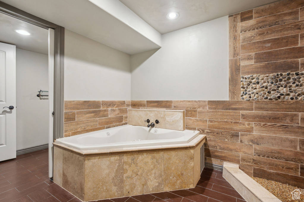 Bathroom with tiled bath