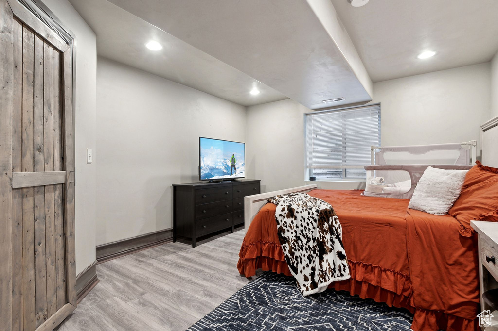 Bedroom featuring light hardwood / wood-style floors