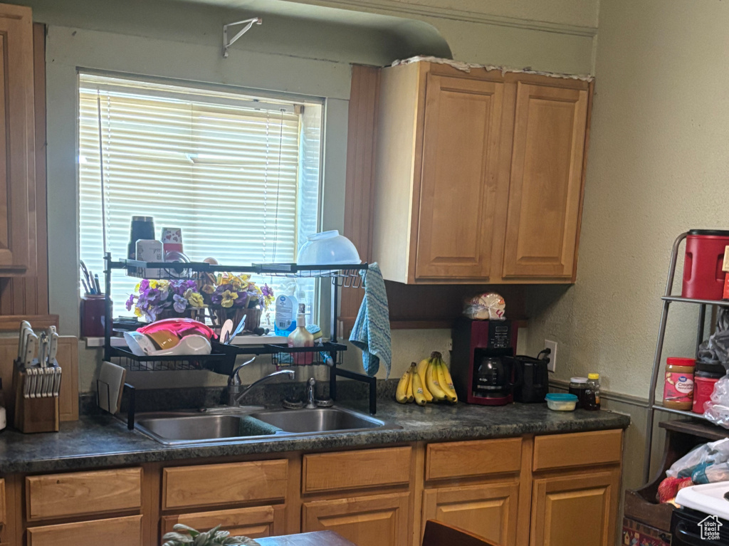 Kitchen with sink and white electric range oven
