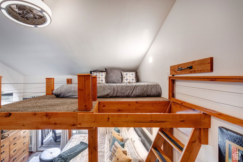 Bedroom with vaulted ceiling