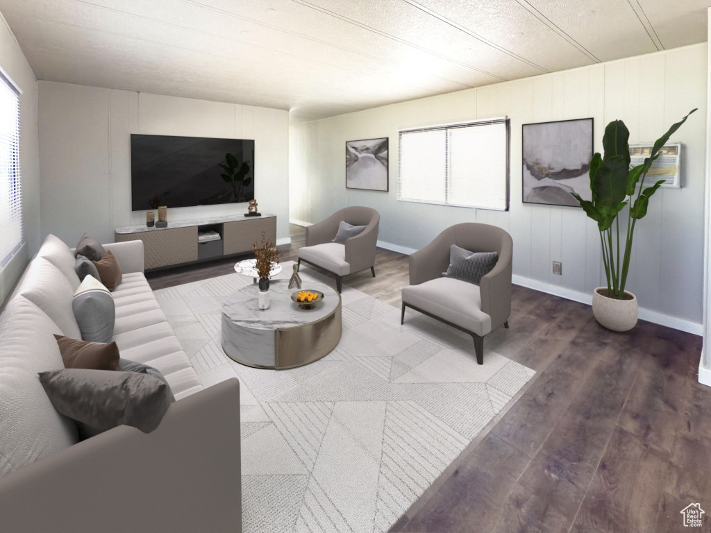 Living area featuring wood finished floors and baseboards