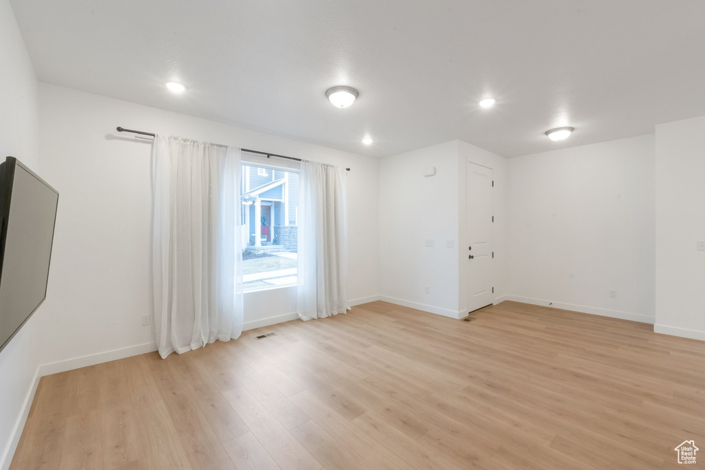 Spare room featuring light hardwood / wood-style floors