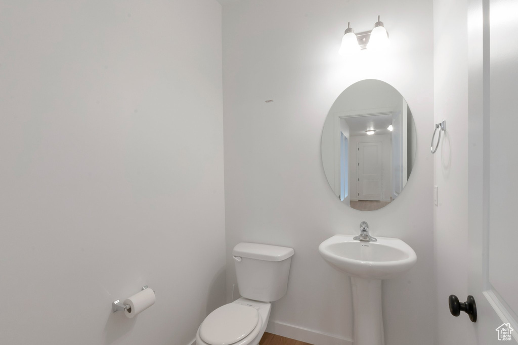 Bathroom featuring toilet and sink