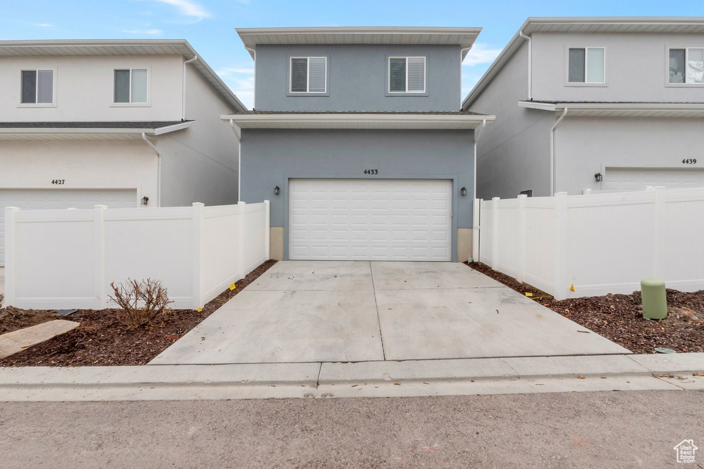 View of front of house with a garage