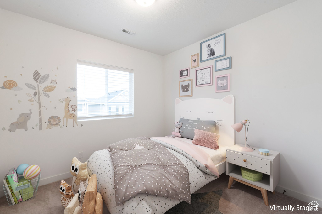 Bedroom with carpet flooring