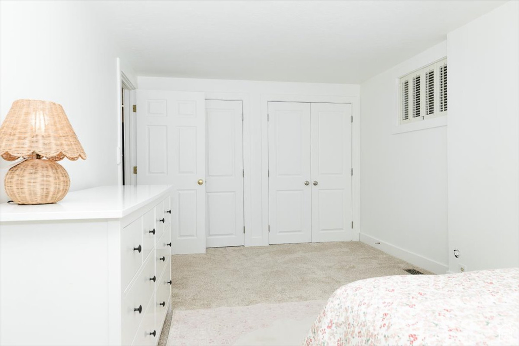 View of carpeted bedroom