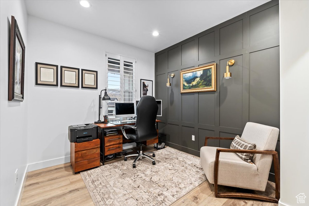 Home office featuring light wood-type flooring