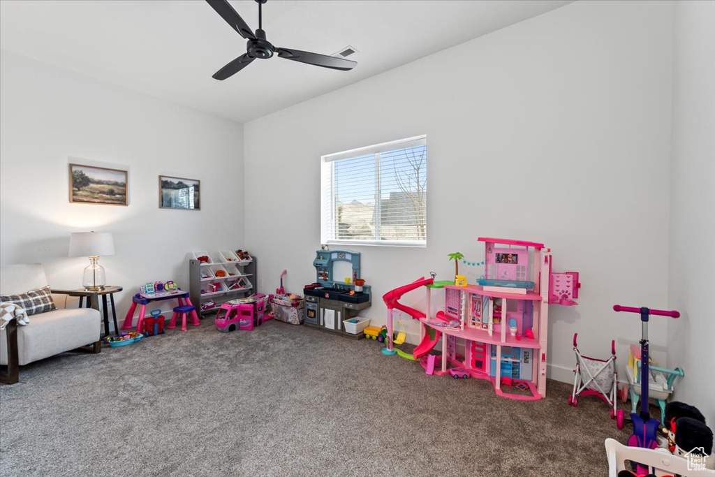 Game room featuring ceiling fan and carpet flooring