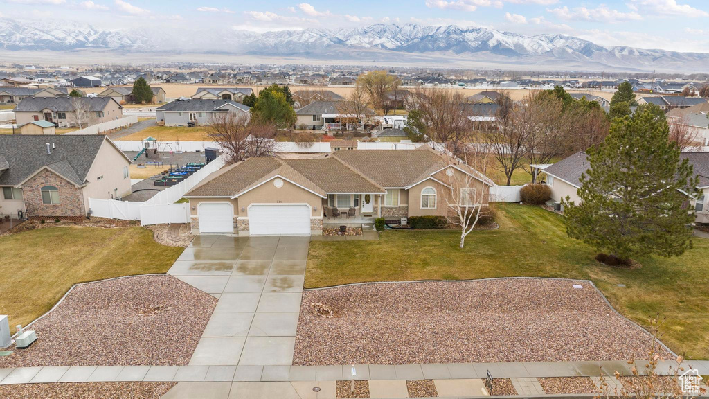 Aerial view featuring a residential view and a mountain view