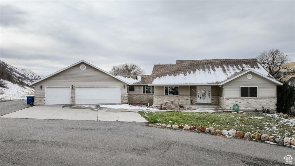 Single story home with a garage