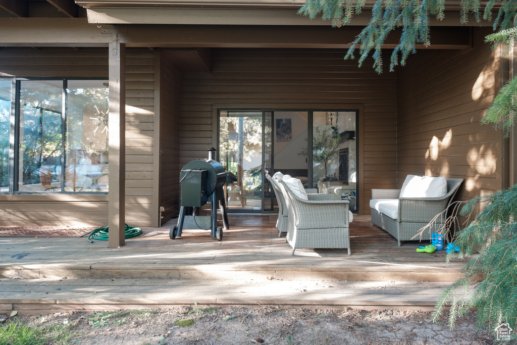 View of patio / terrace featuring an outdoor hangout area, grilling area, and a deck