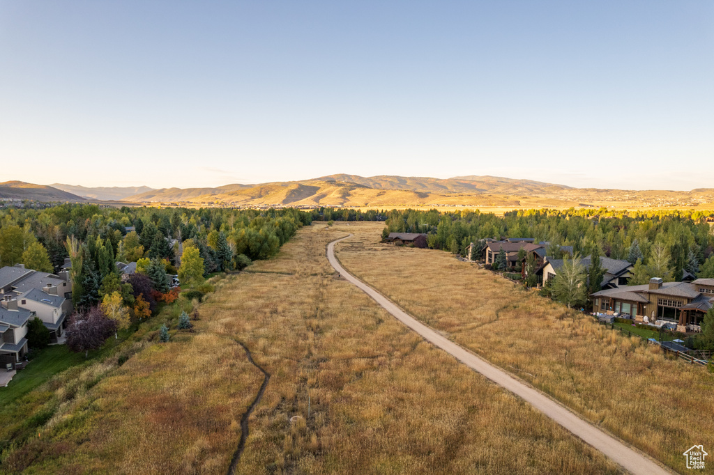 Birds eye view of property featuring a mountain view