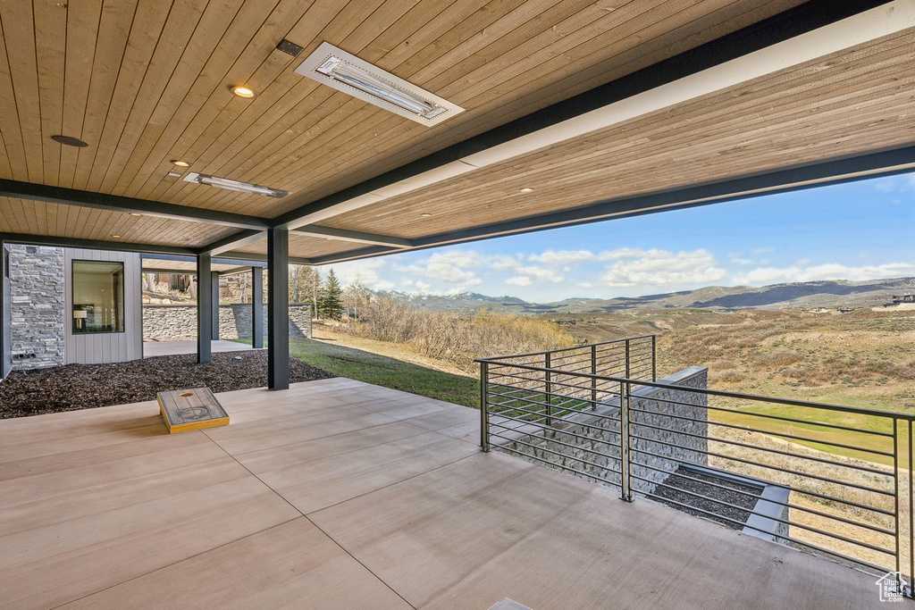 View of patio / terrace with a mountain view