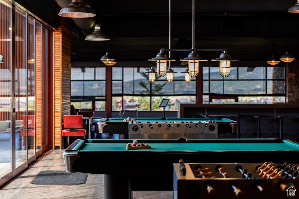 Playroom featuring pool table and hardwood / wood-style flooring