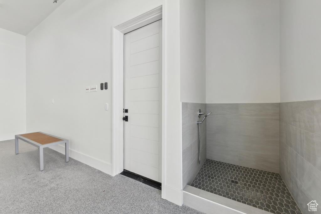 Bathroom featuring tiled shower