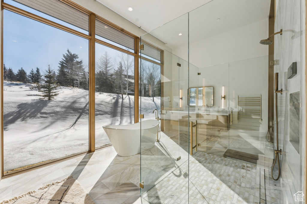 Bathroom with plus walk in shower