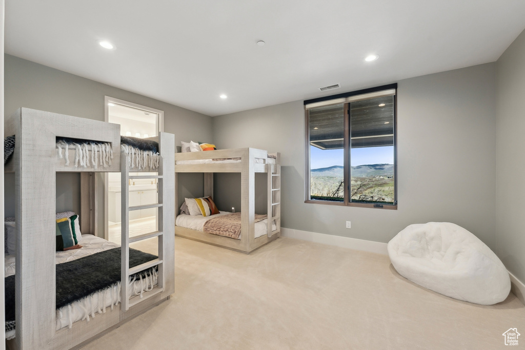 Bedroom with carpet, recessed lighting, and baseboards