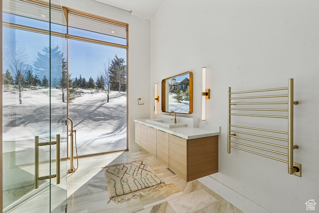 Bathroom featuring vanity and radiator