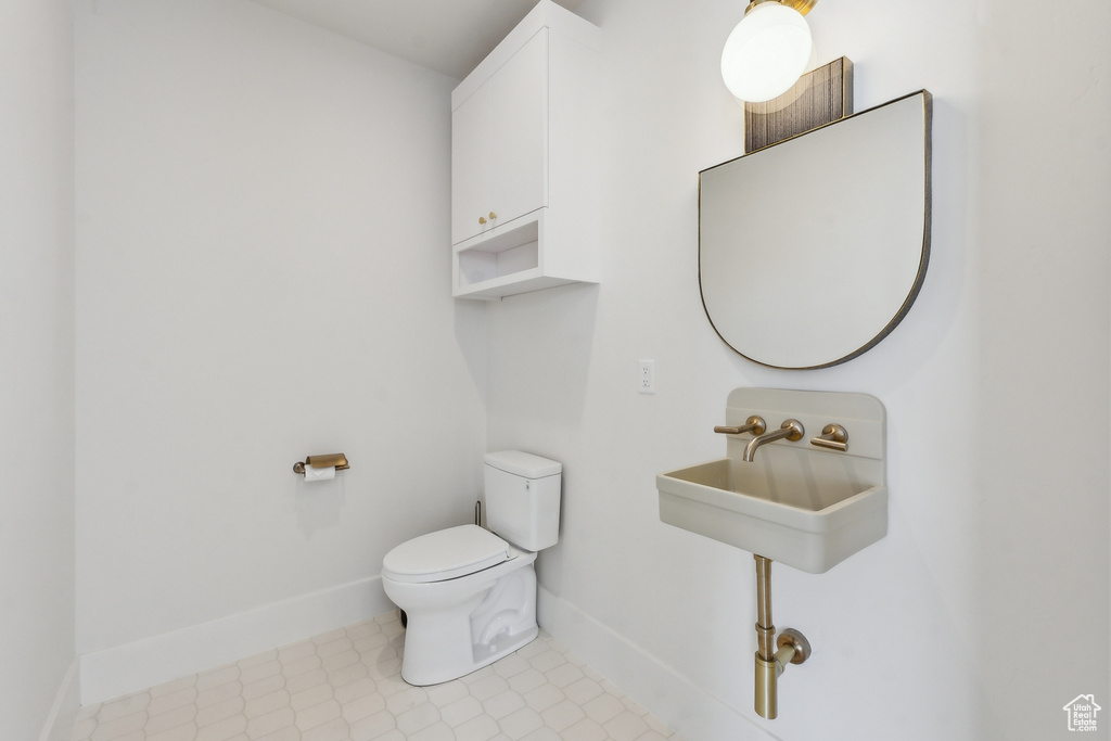 Bathroom with toilet and sink