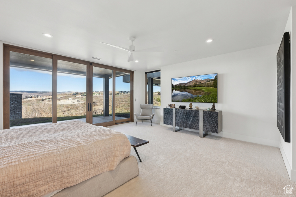Carpeted bedroom with recessed lighting, access to exterior, a ceiling fan, and baseboards