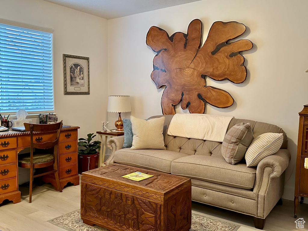 Living room with light wood-type flooring