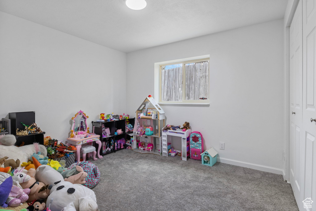 Playroom featuring carpet