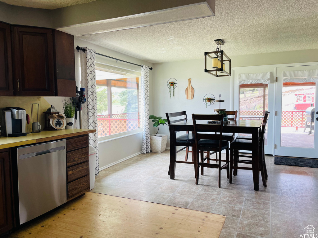 Dining area with a textured ceiling