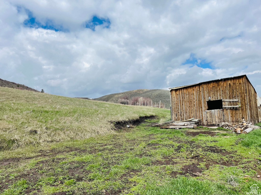 Exterior space featuring a rural view and a mountain view