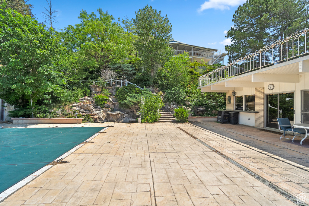 View of patio / terrace featuring a covered pool