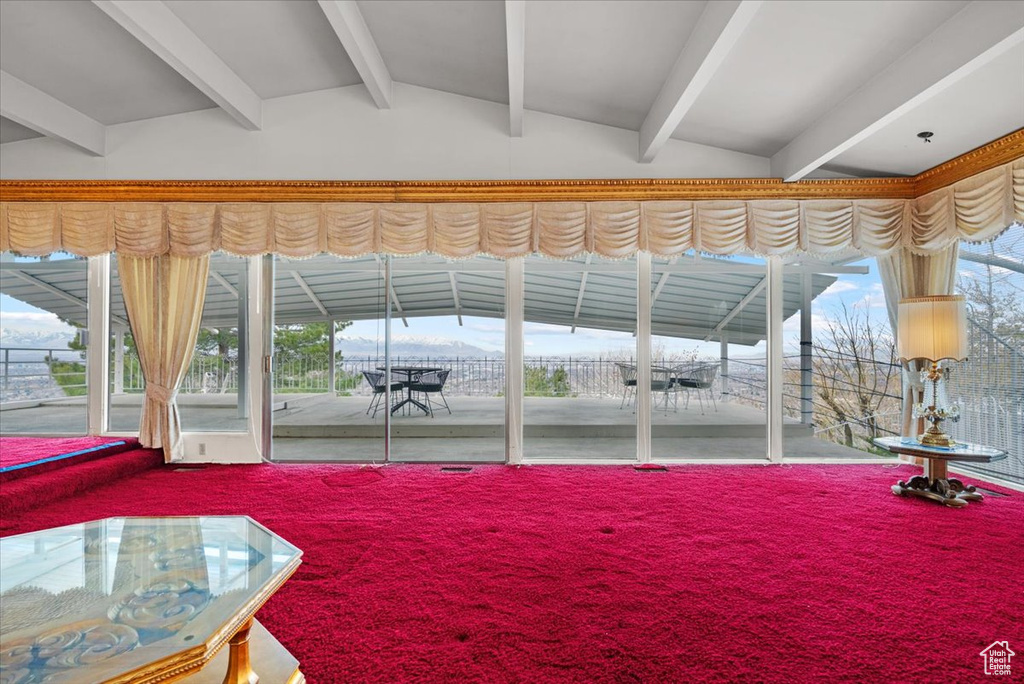 Interior space with lofted ceiling with beams