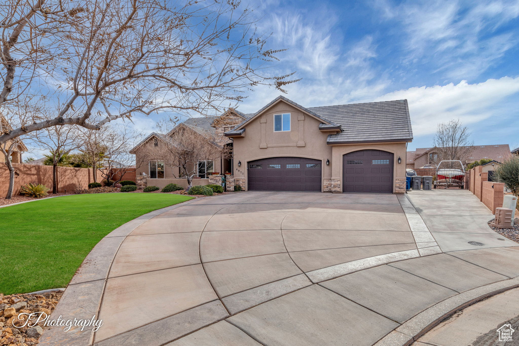 View of front of house with a front yard