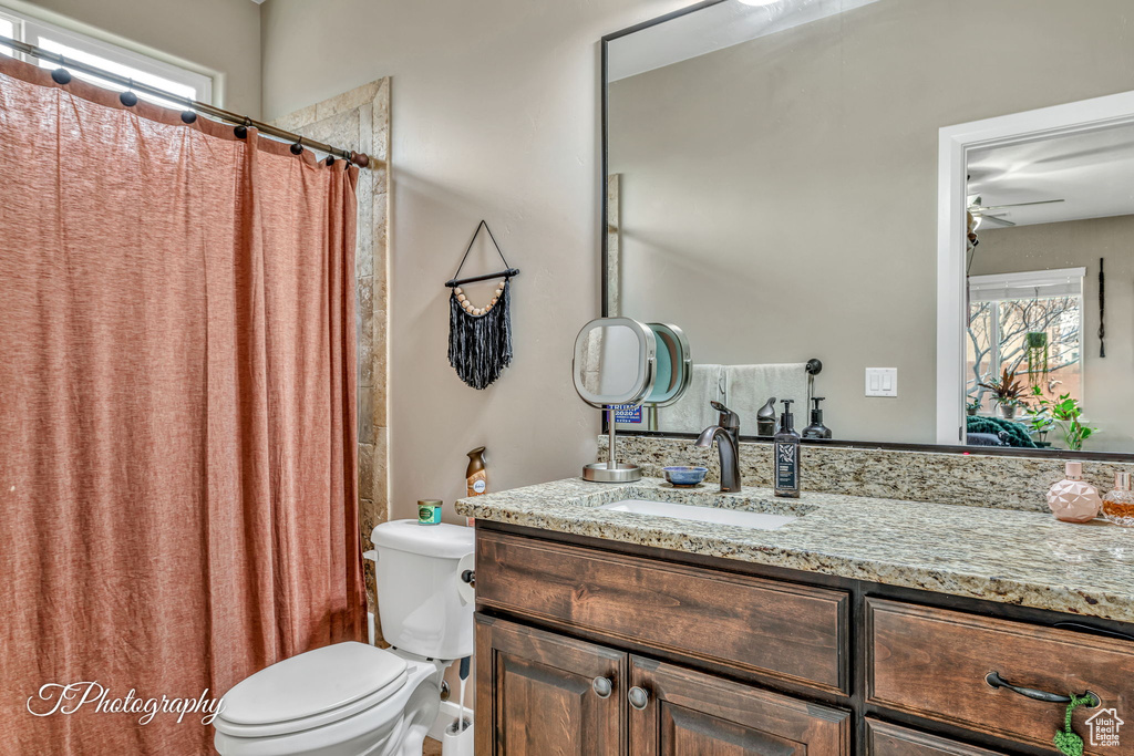 Bathroom with vanity and toilet