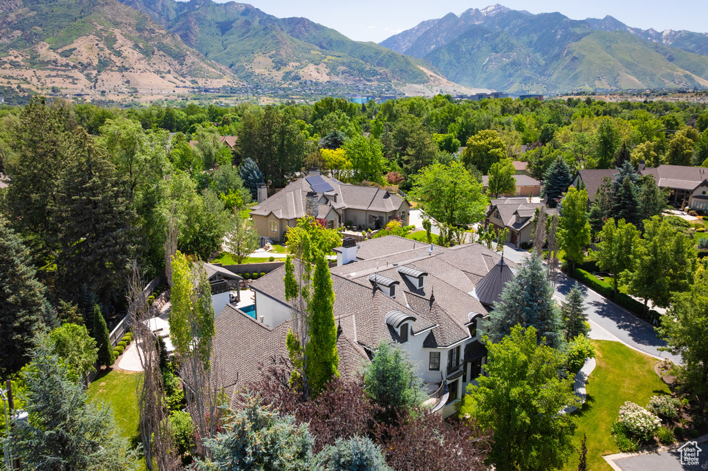Aerial view of residential area with a mountainous background