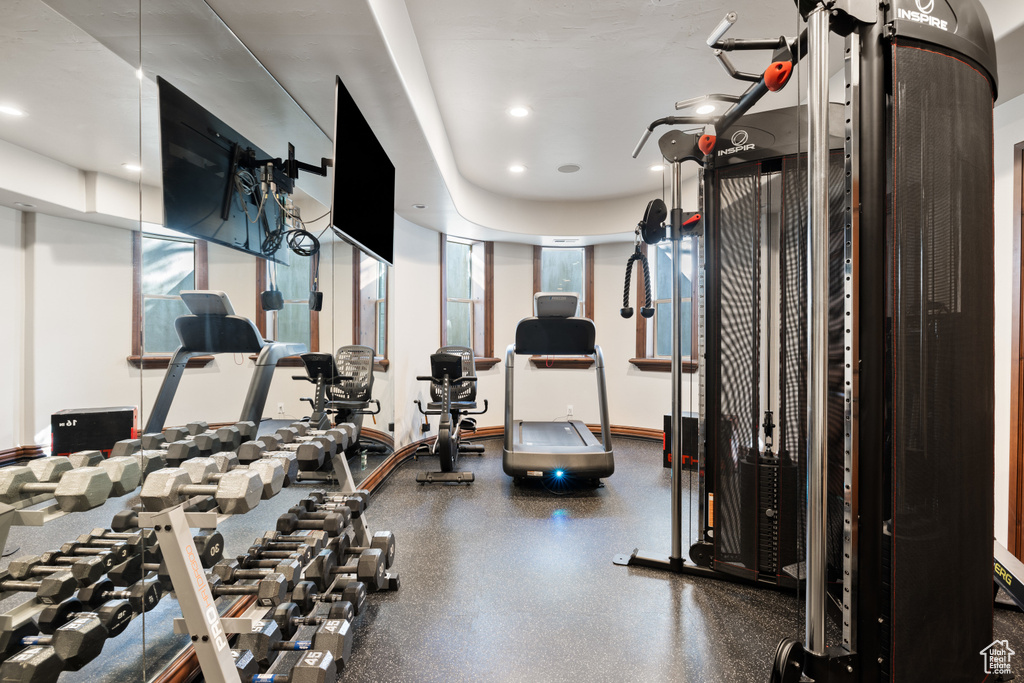 Workout area featuring recessed lighting