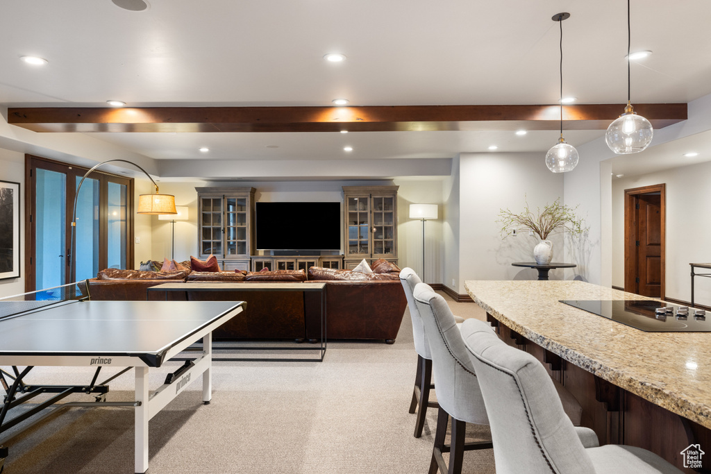 Game room with recessed lighting and light carpet