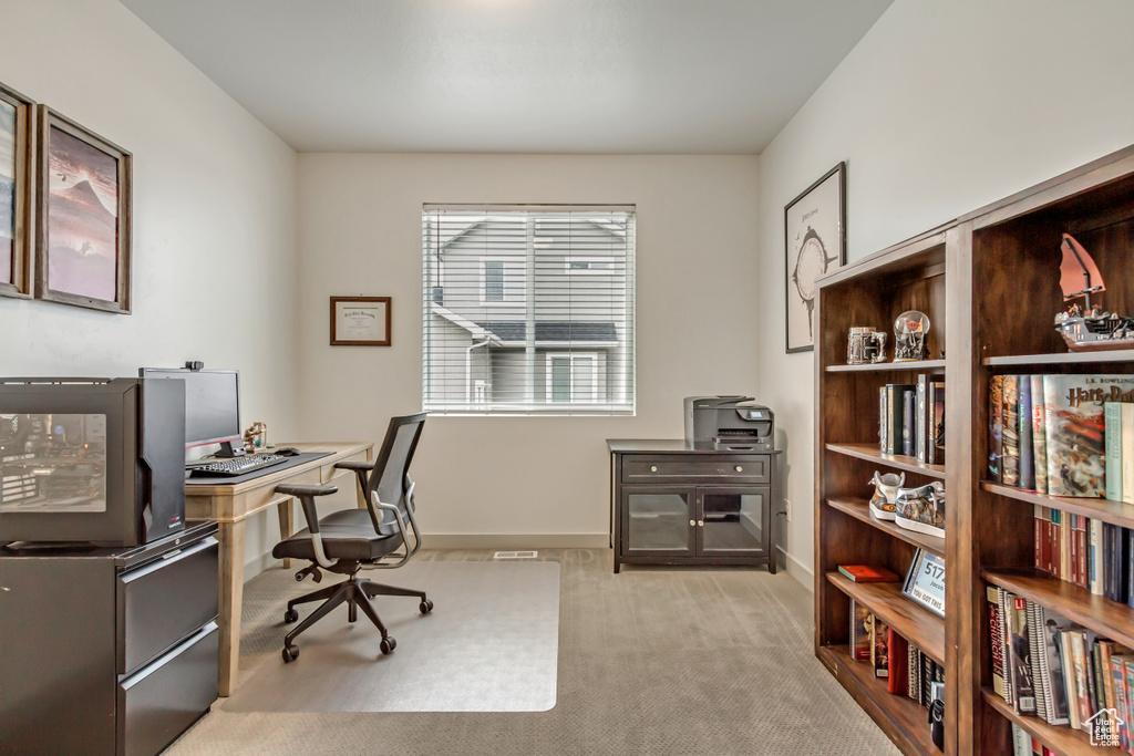 View of carpeted home office