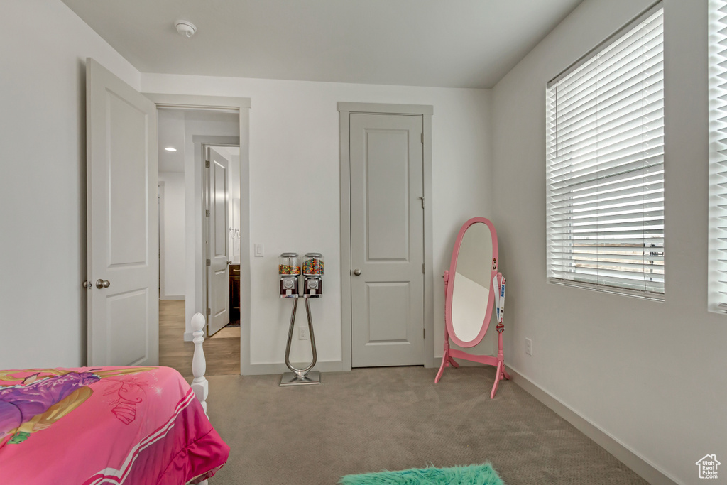 View of carpeted bedroom