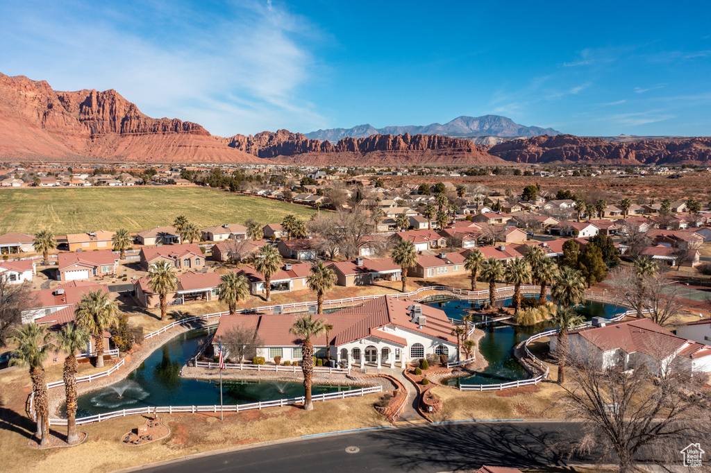 Bird\'s eye view with a water and mountain view