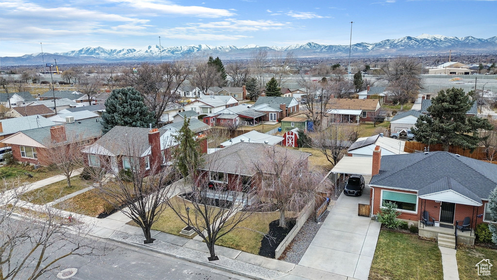 Birds eye view of property with a mountain view