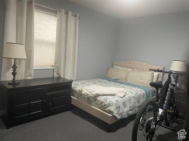 Bedroom featuring carpet flooring