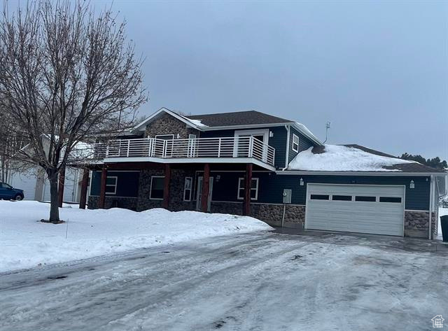 View of property featuring a garage