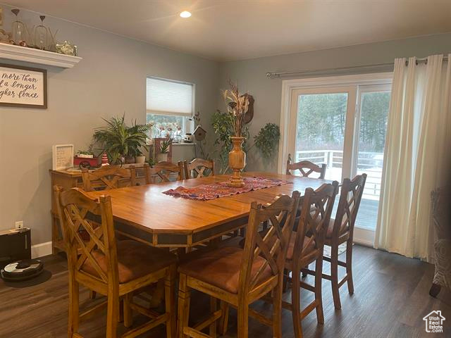Dining space featuring dark hardwood / wood-style flooring