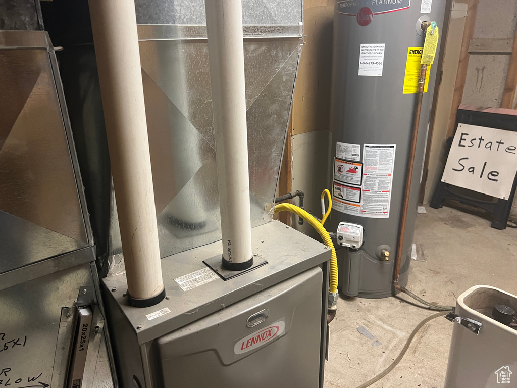 Utilities featuring heating unit and water heater