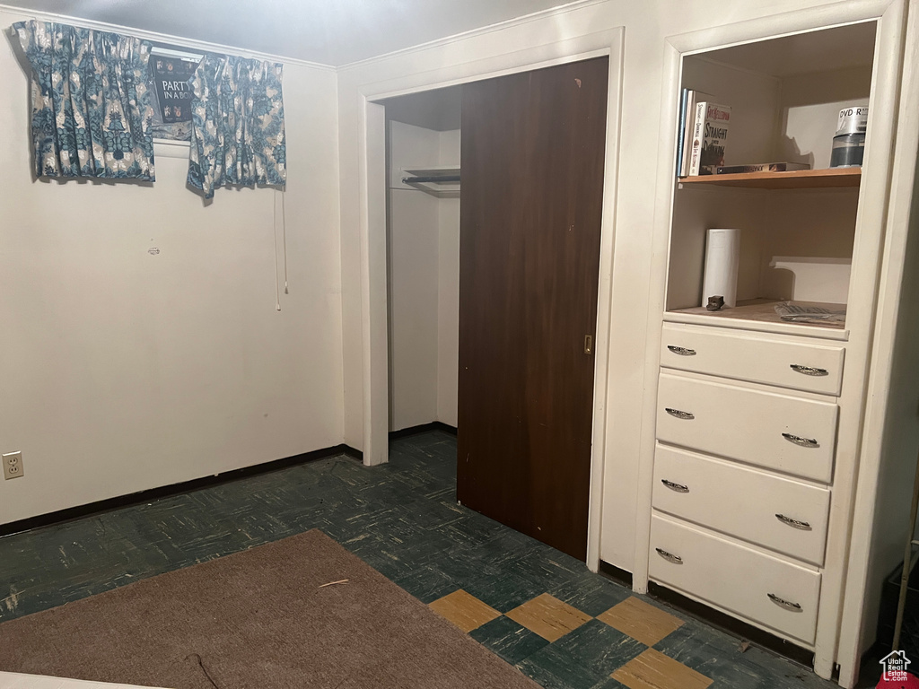 Unfurnished bedroom with a closet