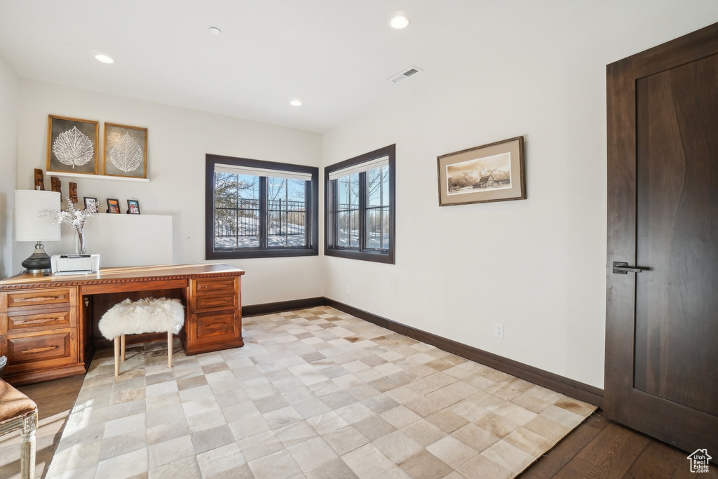 Office featuring baseboards and recessed lighting