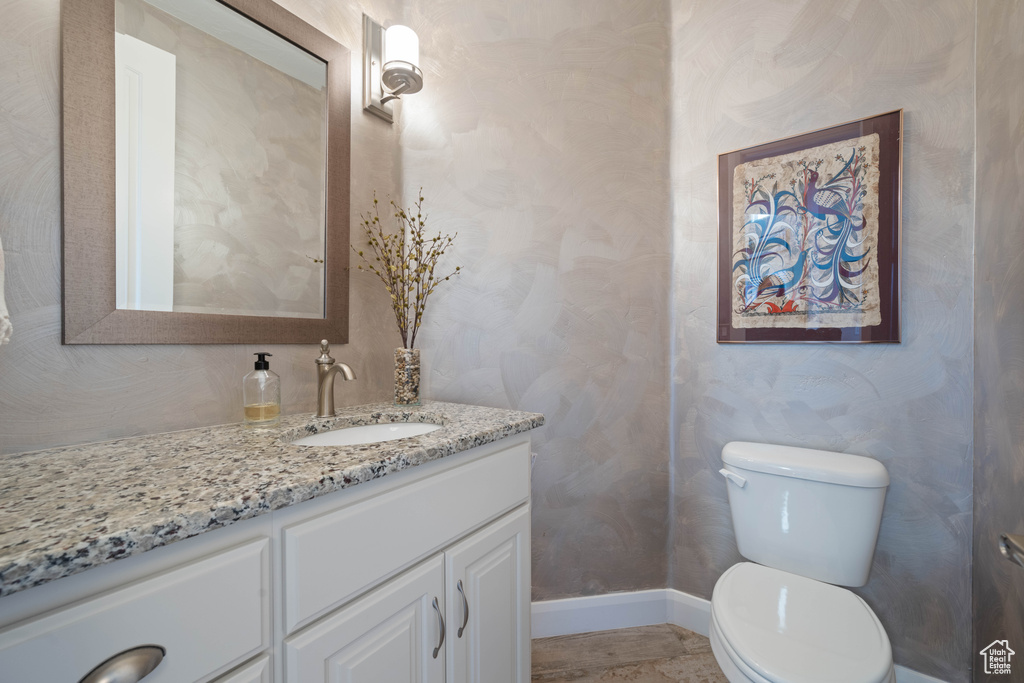 Bathroom with vanity and toilet