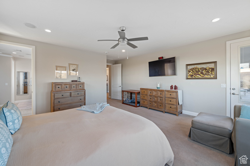 Bedroom with light carpet and ceiling fan