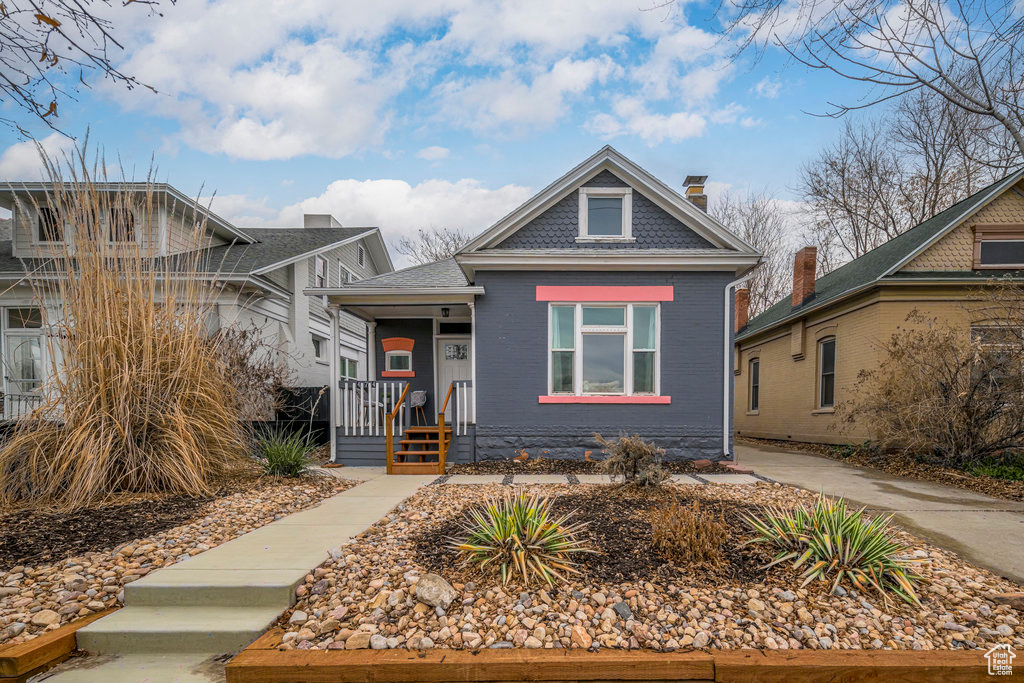 View of front of house featuring covered porch