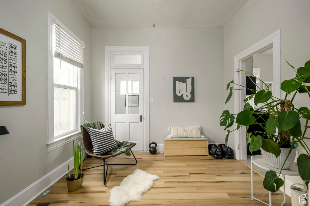 Sitting room featuring hardwood / wood-style floors