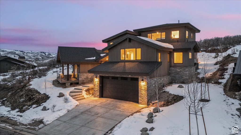 View of front of home featuring a garage